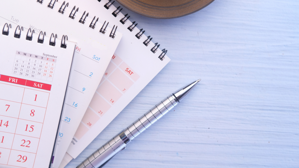 Calendar with a marked date and pen on a desk, promoting Rector’s Day on October 4, 2024.