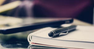 pencil and notes lay down on the desk