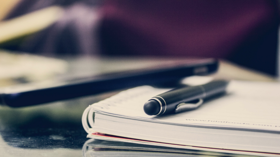 pencil and notes lay down on the desk