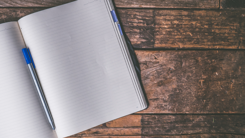 Notebook lay on the desk