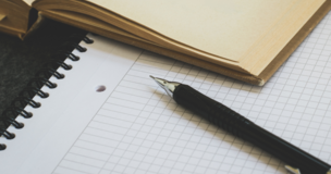 notes and pencil lay down on the desk
