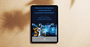 okładka monografii na tablecie