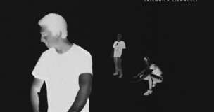 High-contrast photo of two people, one with a cane, representing accessibility and blindness awareness.