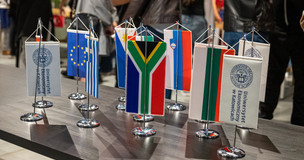 photo from last year meeting, national flags 