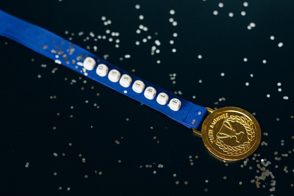 Obrazek przedstawia zwycięski medal