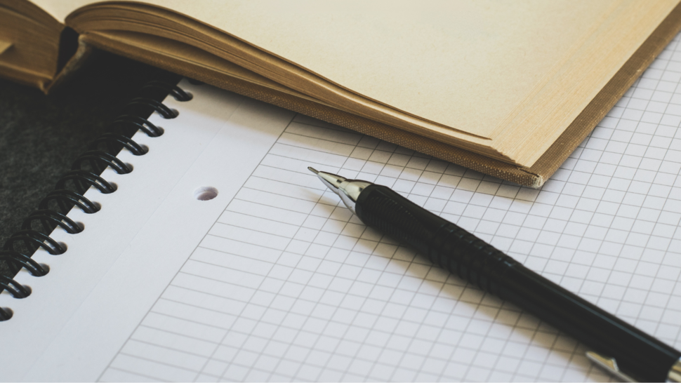 notes and pencil lay down on the desk